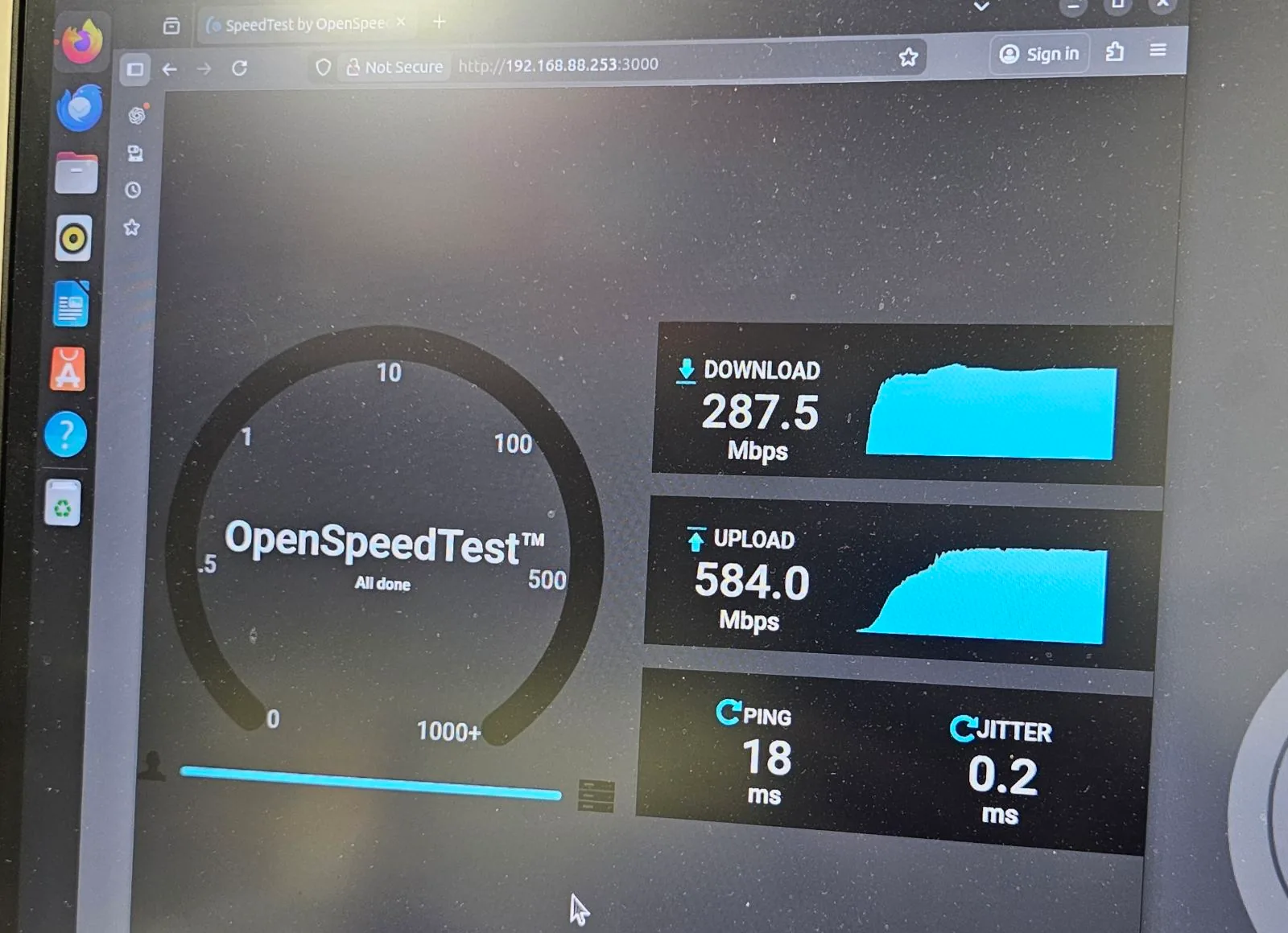 OpenSpeedTest result showing 584 Mbps upload